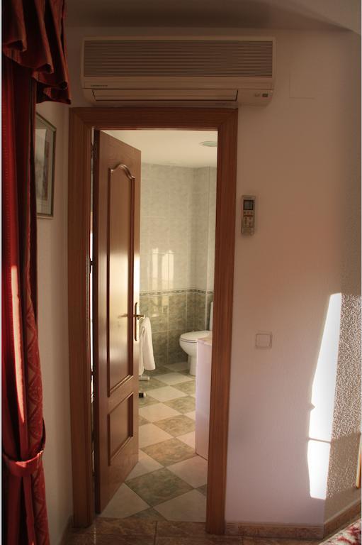 Hostal González Guadarrama Habitación foto